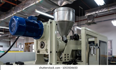 Plastic Injection Molding Machine In A Modern Hi-tech Factory.