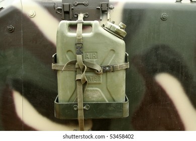 Plastic Jerry Can Attached To The Side Of Camouflaged Military Vehicle