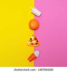 Plastic Junk Food On Colored Background. Fast Food Flat Lay Minimal  Art