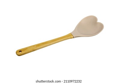 Plastic Kitchen Serving Spoon Isolated On White Background. Spoon Plastic Wooden Handle.