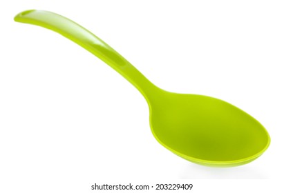 Plastic kitchen spoon isolated on white
