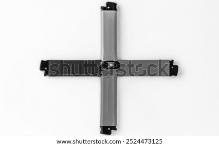 Plastic lighters with mechanical ignition, a compact item for igniting a flame. Black and white horizontal photo from top to bottom.