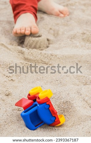 Similar – Shovel and starfish on the beach