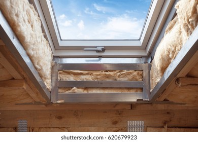 Plastic (mansard) Or Skylight Window On Attic With Environmentally Friendly And Energy Efficient Thermal Insulation Rockwool.