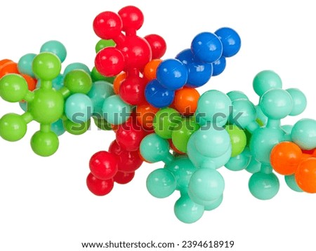 Plastic model of chemical elements of protein molecules, isolated on white background, close up
