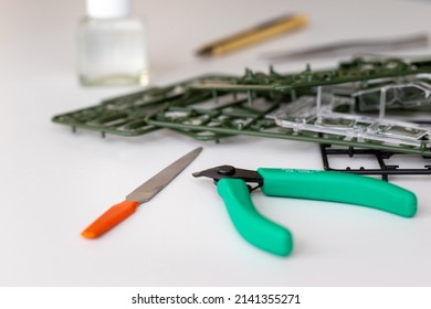 Plastic Model Parts And Tools On The Table