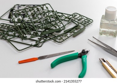 Plastic Model Parts And Tools On The Table