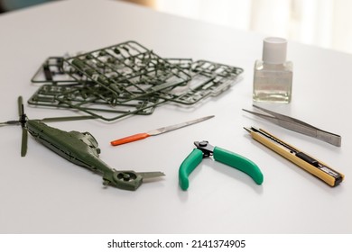 Plastic Model Parts And Tools On The Table