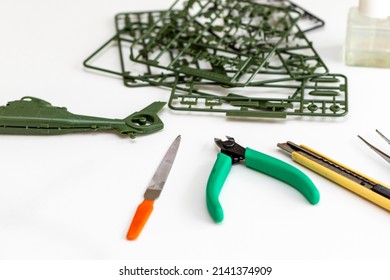 Plastic Model Parts And Tools On The Table