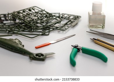 Plastic Model Parts And Tools On The Table