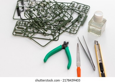 Plastic Model Parts And Tools On The Table