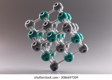 Plastic molecule in shape of square on gray background