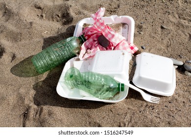 Plastic Ocean Pollution With Plastic Water Bottles, Clam Shell Food Containers And Plastic Cutlery