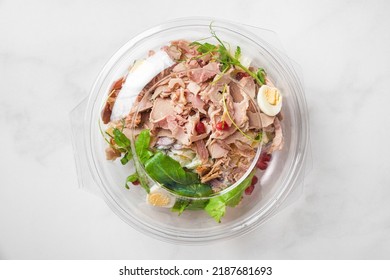 Plastic Package With Healthy Baked Ham Salad For Take Away Or Food Delivery On White Background. Top View. Food In Lunch Box