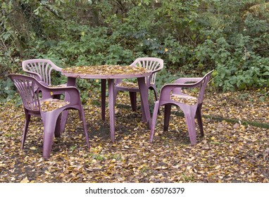 Plastic Patio Furniture With Autumn Leaves