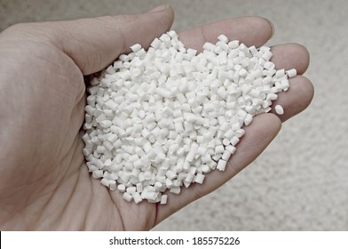 Plastic Pellets In Holding Hand, Raw Material Of Injection Molding.