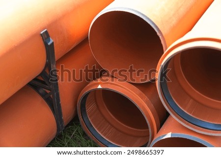 Plastic pipes for external sewerage, elements of a sewerage system. Close-up photo
