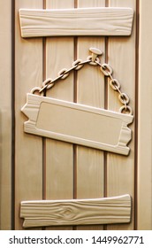 Plastic Plate On A Chain Hanging On A Nail For A Door To A House Or A Doghouse