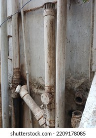 Plastic Plumbing Pipes Outside An Apartment Complex 