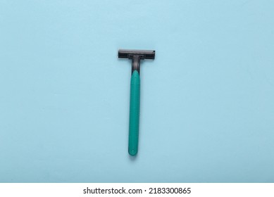 Plastic Razor On A Blue Background