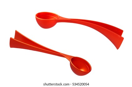 Plastic red ice cream spoon isolated on white background