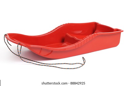 Plastic Red Sled For Skiing On White Background