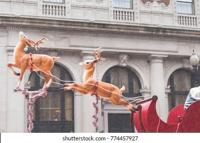 Plastic Reindeer On A Float During A Santa Christmas Parade