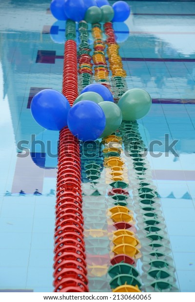 Plastic separating lanes for\
sports pools Separate swimming lanes for swimmers. plastic\
buoys