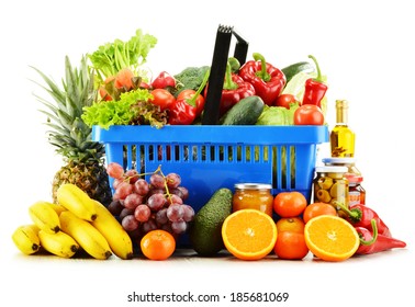 Plastic shopping basket with groceries isolated on white background - Shutterstock ID 185681069