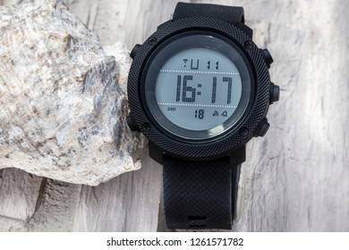 Plastic Smart Watch With Rubber Wrist Strap With Clasp.