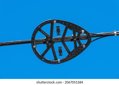 Plastic snow shoe, fiber optic storage, with optical cable against blue sky - Powered by Shutterstock