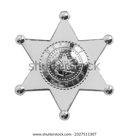 Plastic Star Police Badge Cut Out on White.