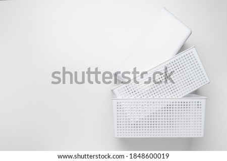 Plastic storage case on white background