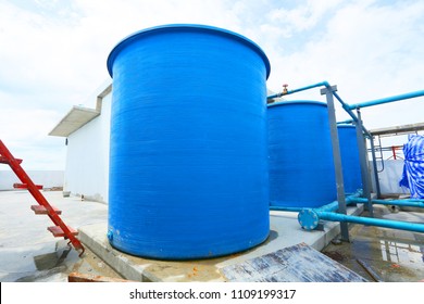 Plastic Storage Water Tank On Building.