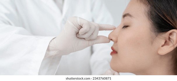 plastic surgery, beauty, Surgeon or beautician touching woman face, surgical procedure that involve altering shape of nose, doctor examines patient nose before rhinoplasty, medical assistance, health

