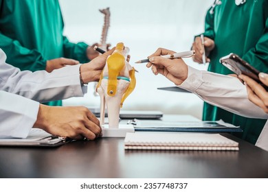 Plastic surgery Medical meeting healthcare and doctors, orthopedic surgeon, orthopedist, ER surgery team discussing on diagnostic exam, Breast implants, Breast enlargement surgery, Hair transplant - Powered by Shutterstock