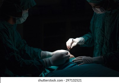 Plastic surgery wrinkle reduction , asian man during surgery using a scalpel , Plastic surgery.