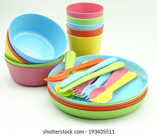 Plastic tableware in various colors - Shutterstock ID 193435511