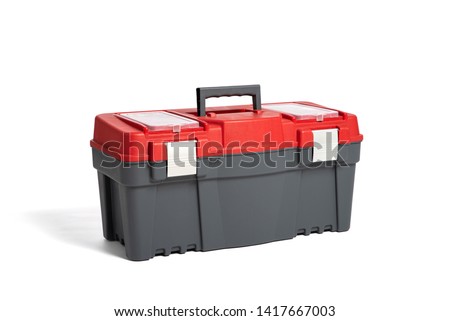Plastic tool box on a white background. Set of working tools. Do it yourself