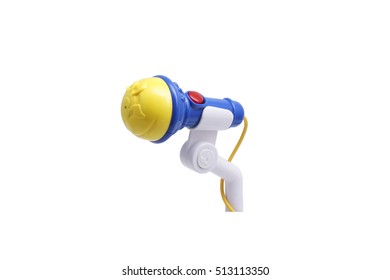 Plastic Toy Microphone. Isolated On White.