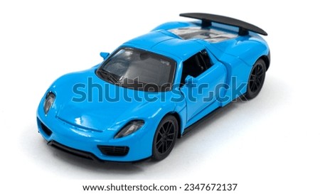 Plastic toy sport car isolated on white background. . High quality photo