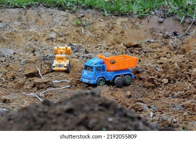 Plastic Toy Truck On The Ground