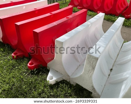 Plastic traffic barriers also called as Temporary road barrier. Safety plastic fencing. 