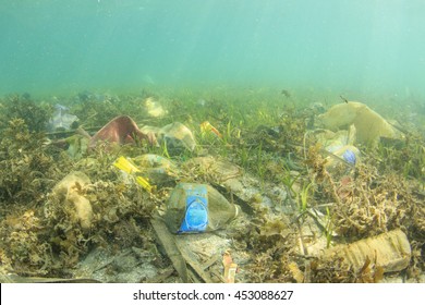 Plastic Trash Bags And Bottles Pollution In Ocean