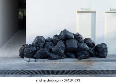 Plastic Trash Bags On Outside Street Apartment