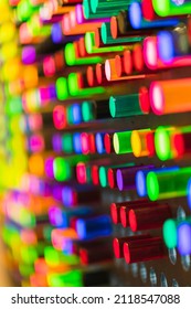 Plastic Tube Neon Light Color Wall Background,abstract Colorful Acrylic Cylinder Form With Light From Behind Close Up Shot