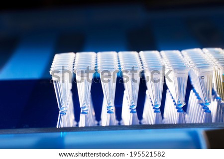 Plastic tubes for DNA amplification. Virus concept (coronavirus, zika, ads, papilloma virus)