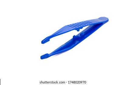 plastic tweezers isolated on white background