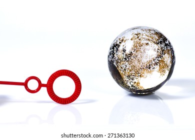 Plastic Wand Of Soap Bubble And A Crystal Ball Isolated On White Background.