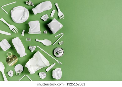 Plastic waste collection on  green background. Concept of Recycling plastic and ecology. Flat lay, top view